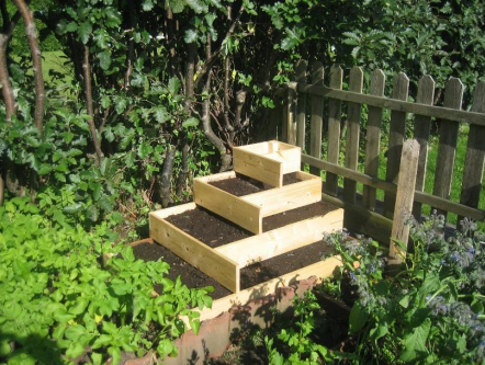 Tiered garden box for efficient vegetable growing